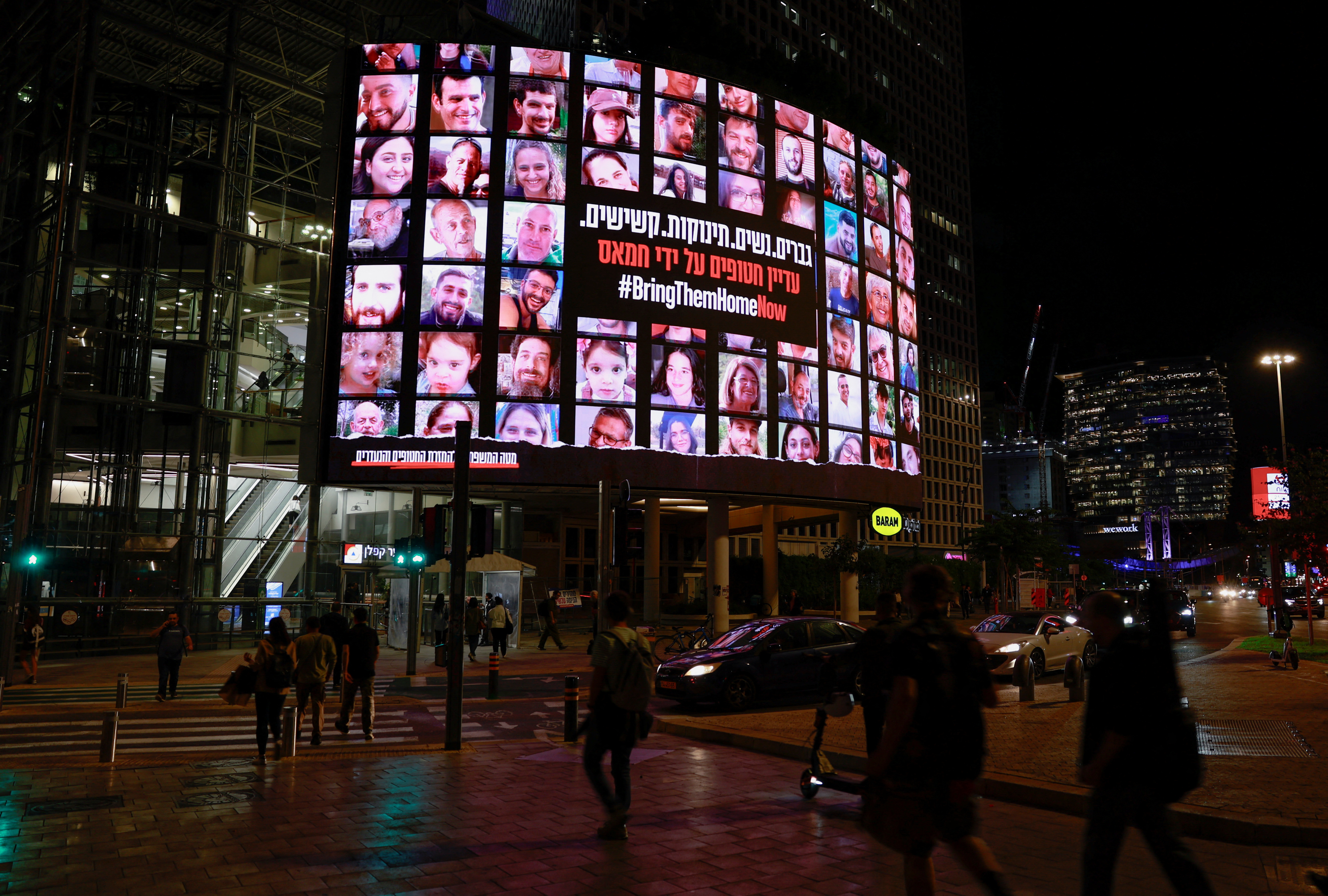 Protesters call for the immediate release of hostages, in Tel Aviv