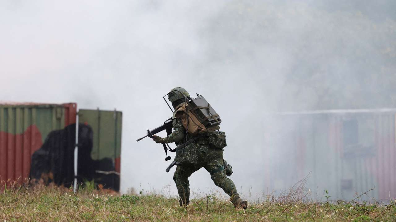 Members of Taiwan’s armed forces participate in a drill as part of a demonstration for the media at a military base in Taitung