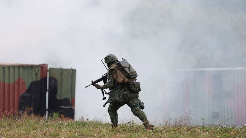 Members of Taiwan’s armed forces participate in a drill as part of a demonstration for the media at a military base in Taitung