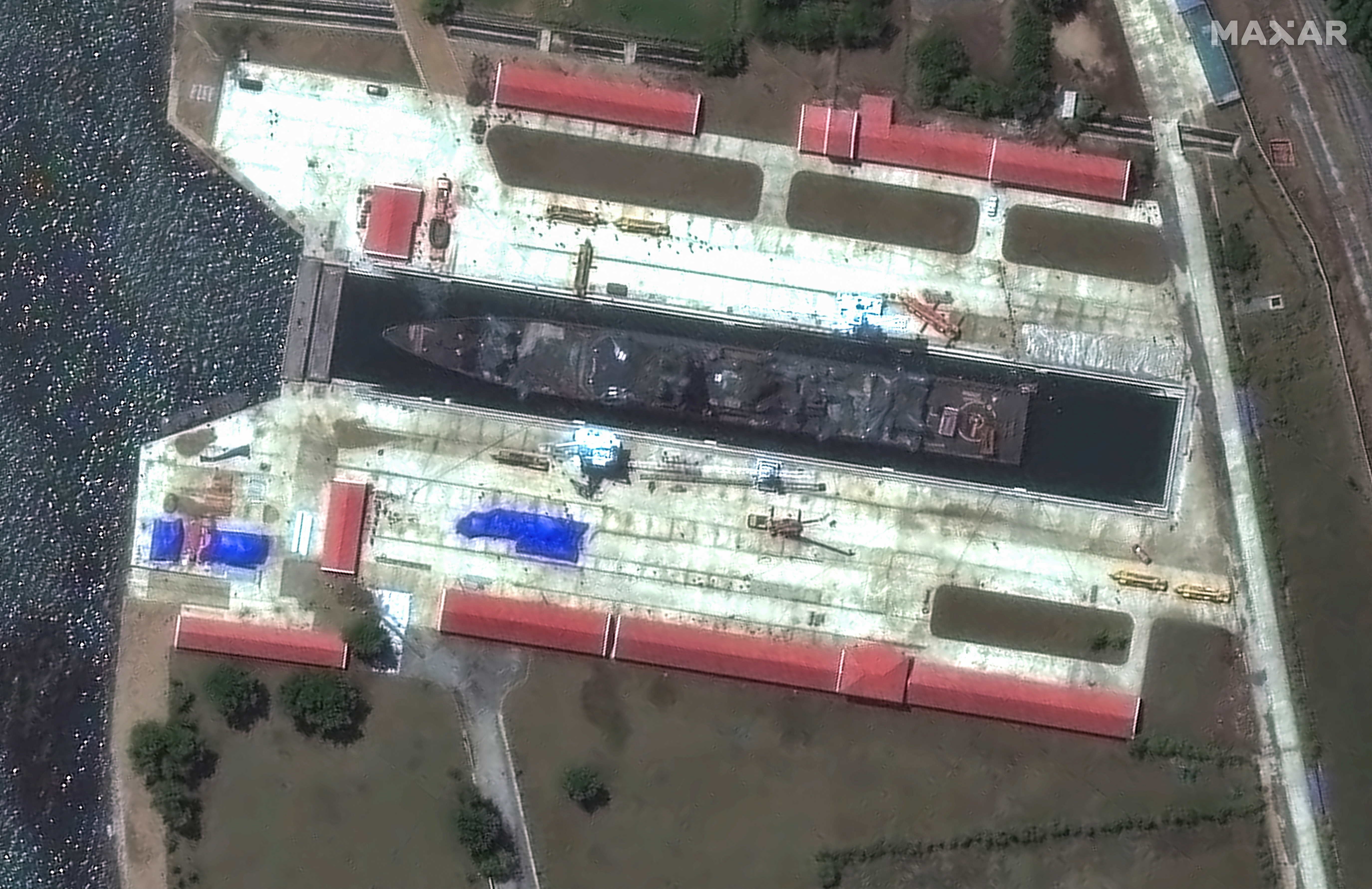 A satellite image shows a Choe Hyon-class destroyer, which was damaged in May upon its attempted first launch, in Rajin