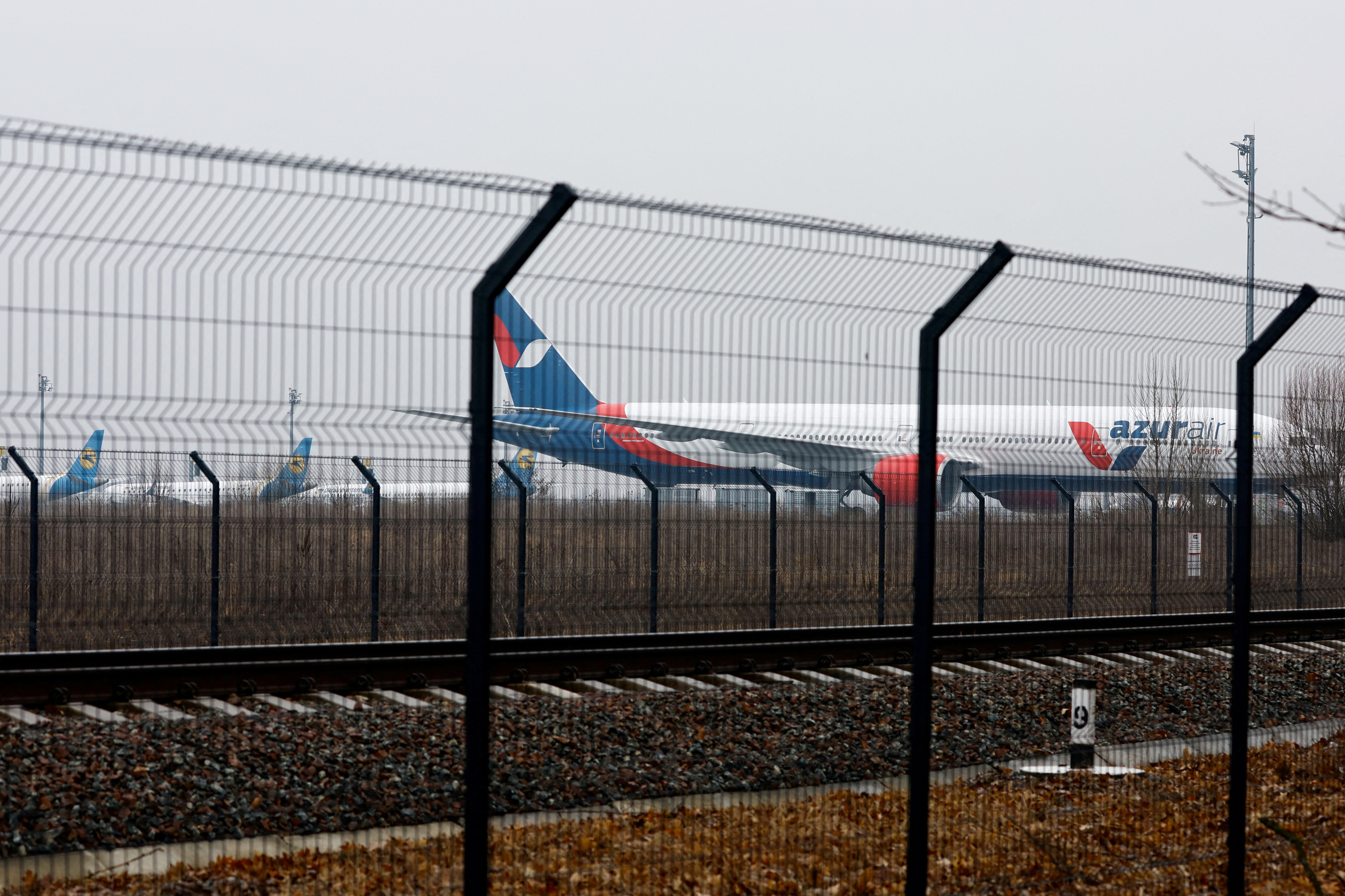 FILE PHOTO: Parked planes are seen at Boryspil International Airport after Russia launched a massive military operation against Ukraine