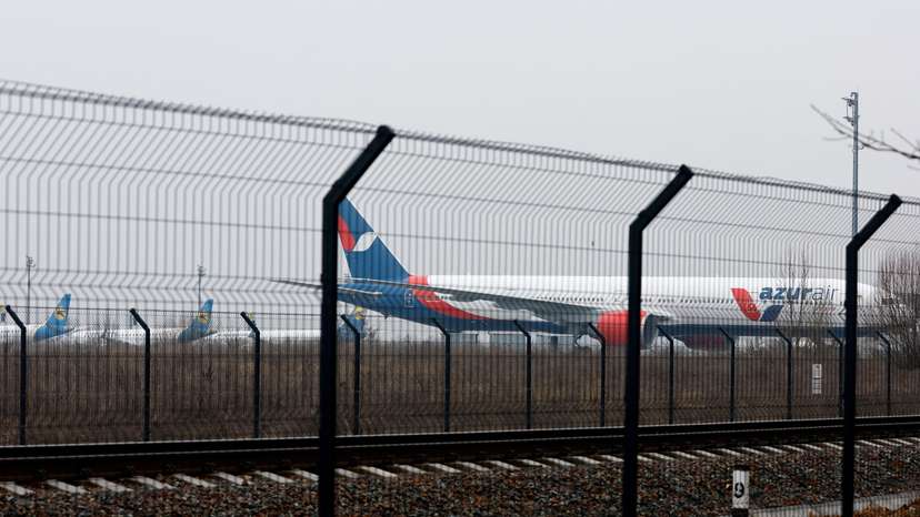 FILE PHOTO: Parked planes are seen at Boryspil International Airport after Russia launched a massive military operation against Ukraine