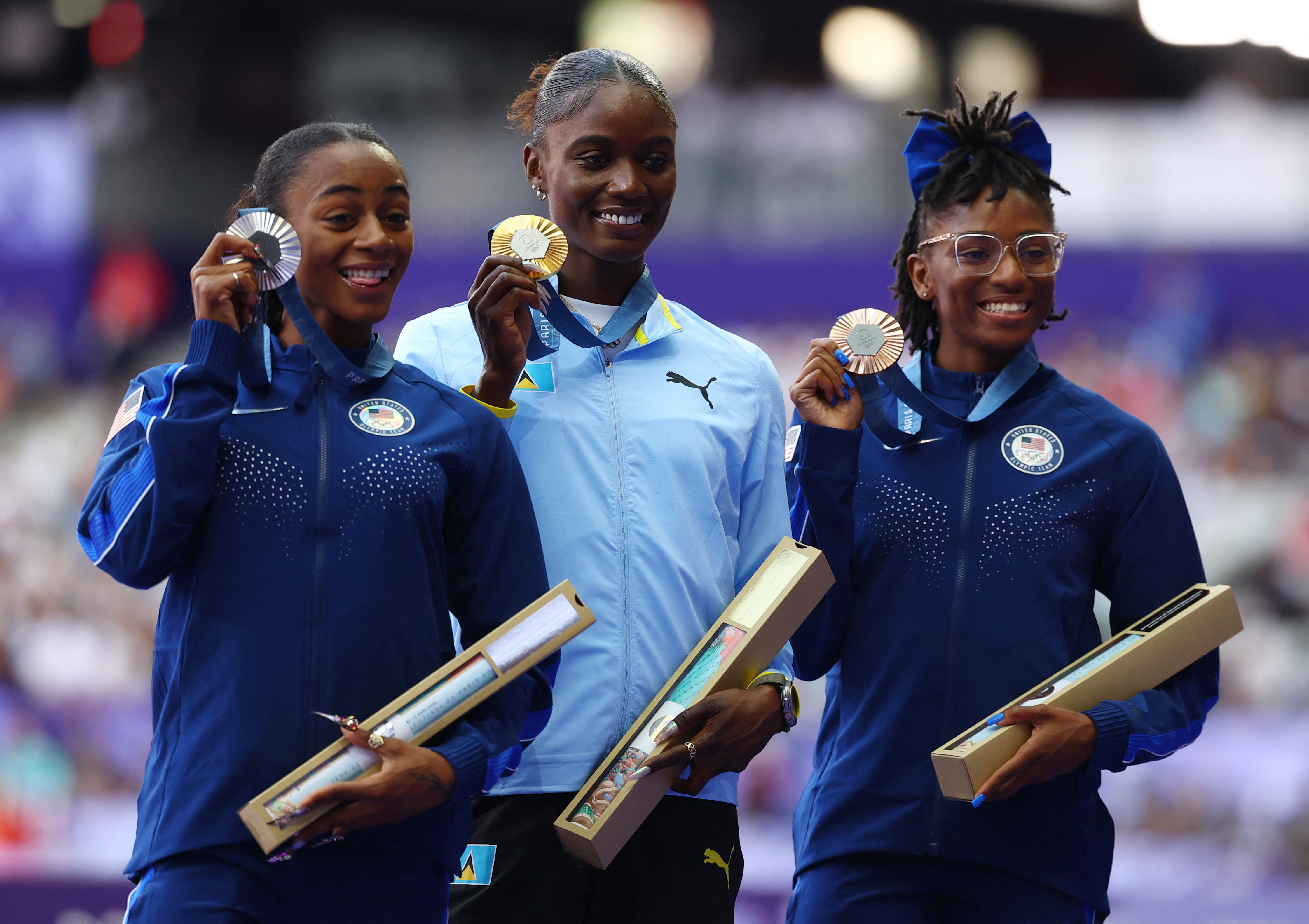 Athletics - Women's 100m Victory Ceremony