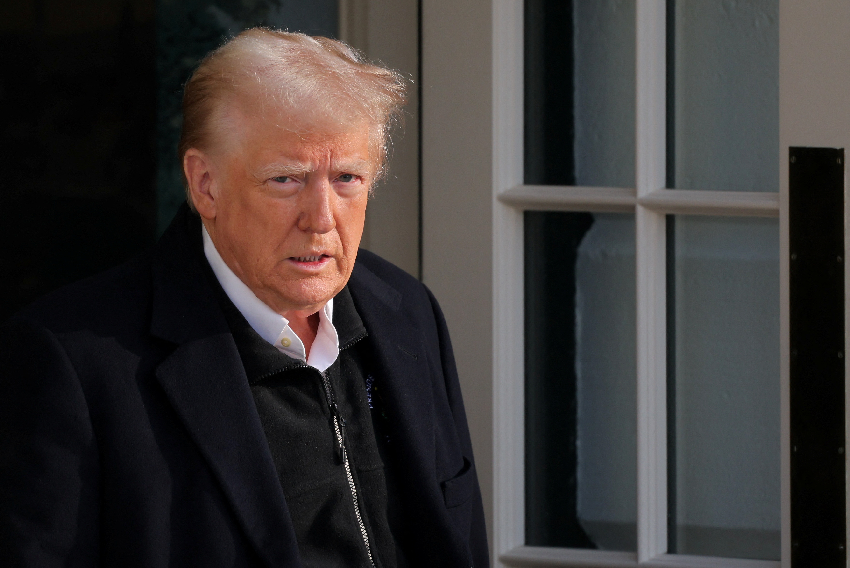 U.S. President Trump departs the White House, in Washington
