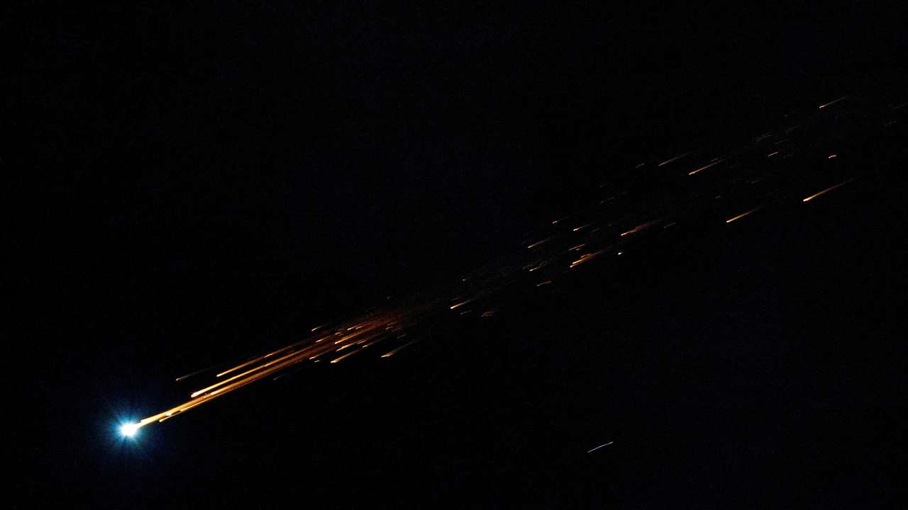 The interception of a missile, that the Israeli military said to have been fired from Yemen, is seen from the city of Ashkelon