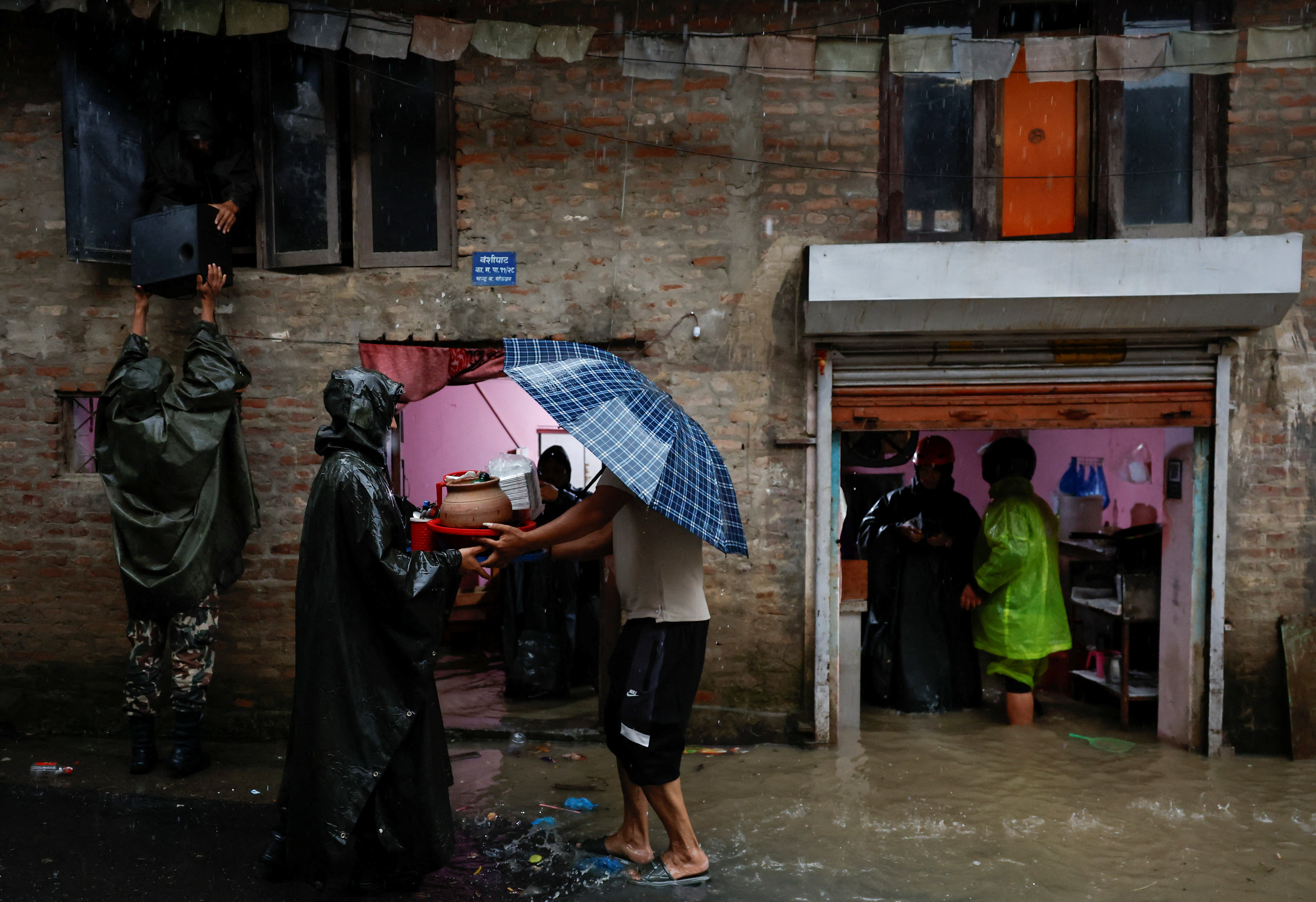 Flood along the bank of overflowing Bagmati River following heavy rains in Kathmandu