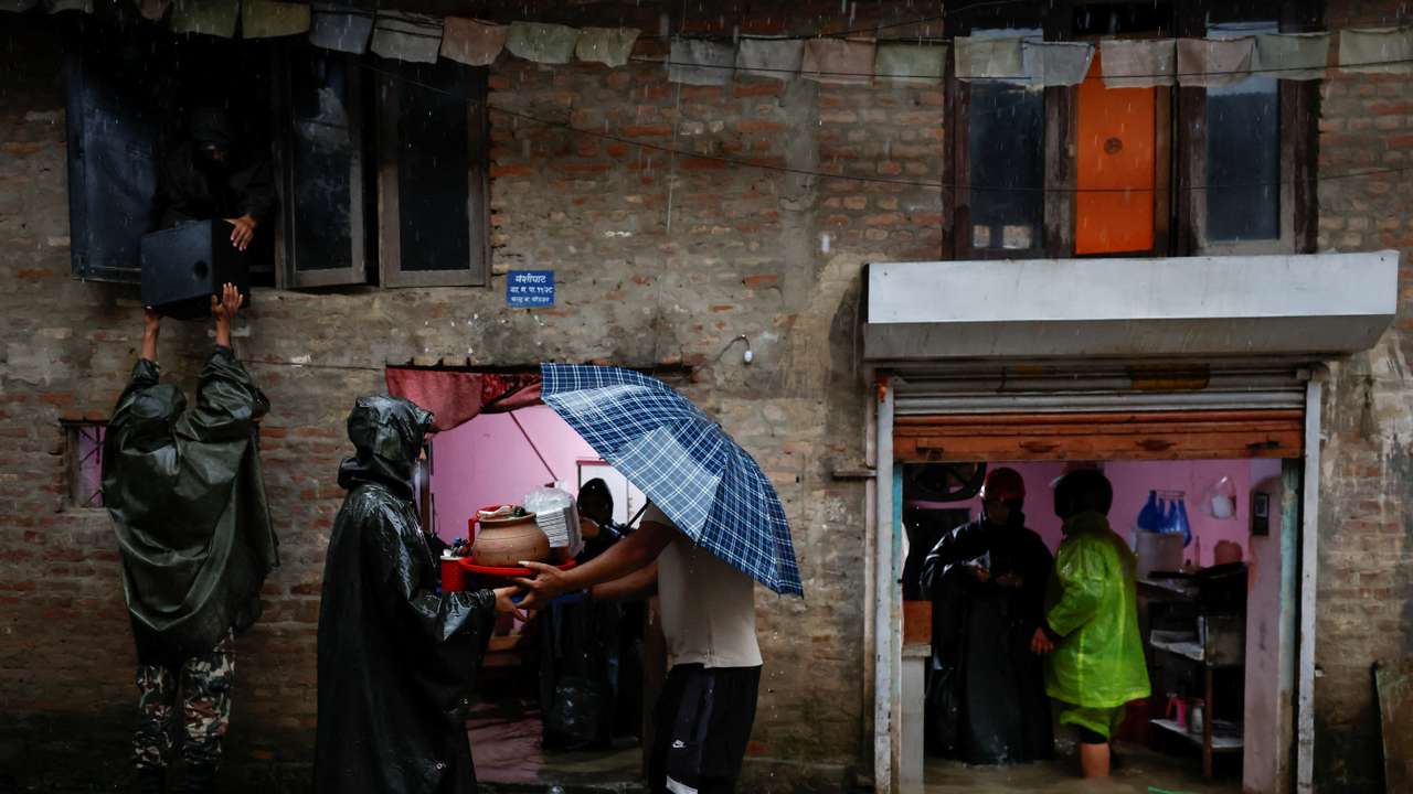 Flood along the bank of overflowing Bagmati River following heavy rains in Kathmandu