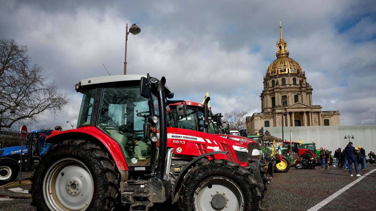 FILE PHOTO: Farmers protest ahead of the opening of the Paris farm show, in Paris