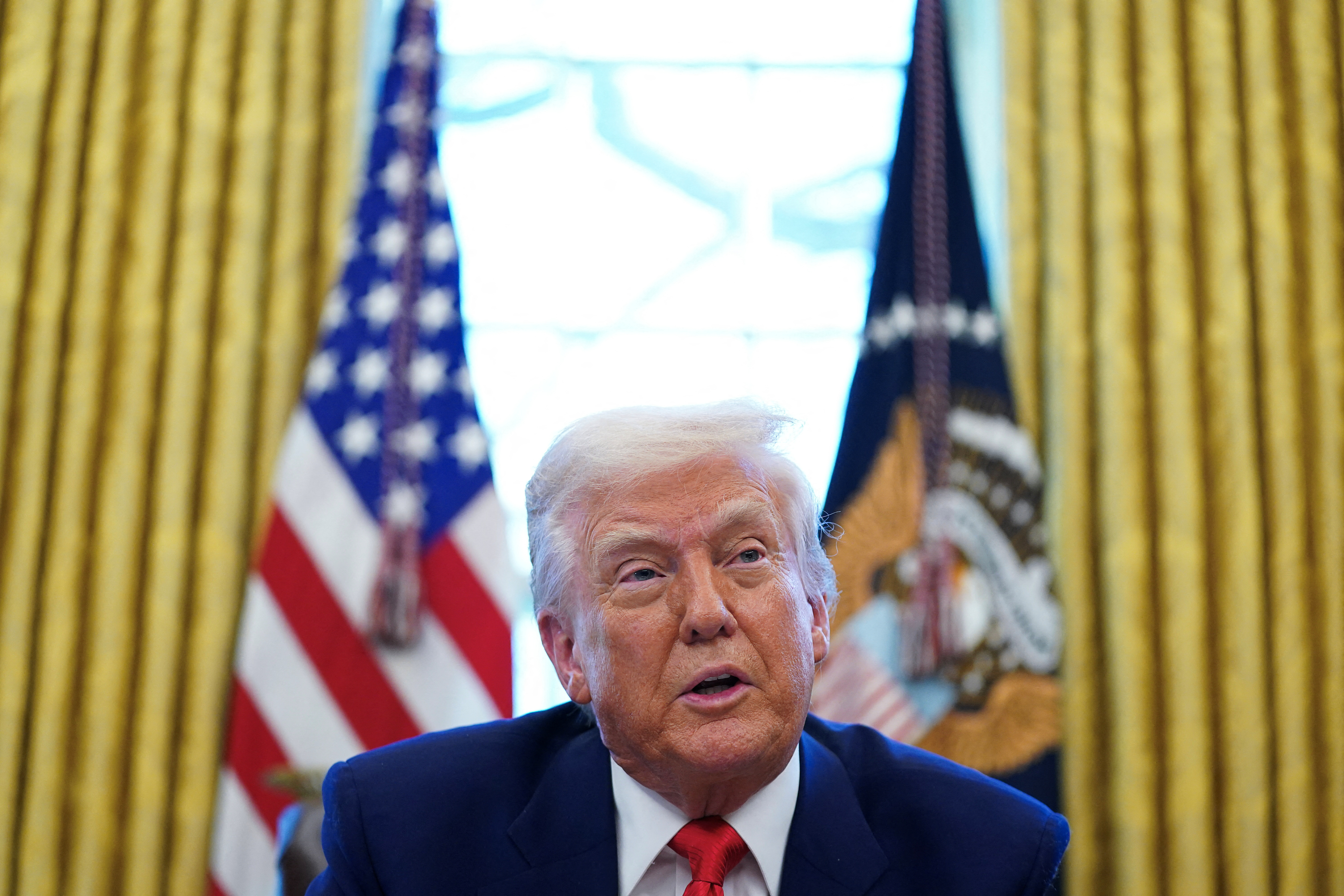 U.S. President Donald Trump signs executive orders at the White House