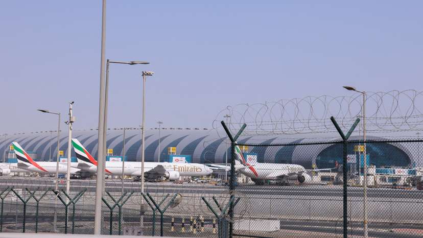 Planes are parked at Terminal 3 of the Dubai International Airport