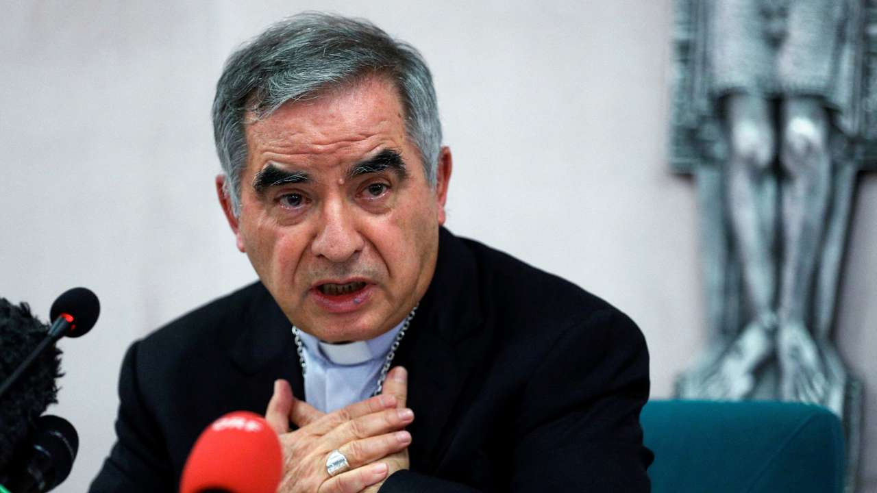 FILE PHOTO: Cardinal Giovanni Angelo Becciu speaks to the media in Rome