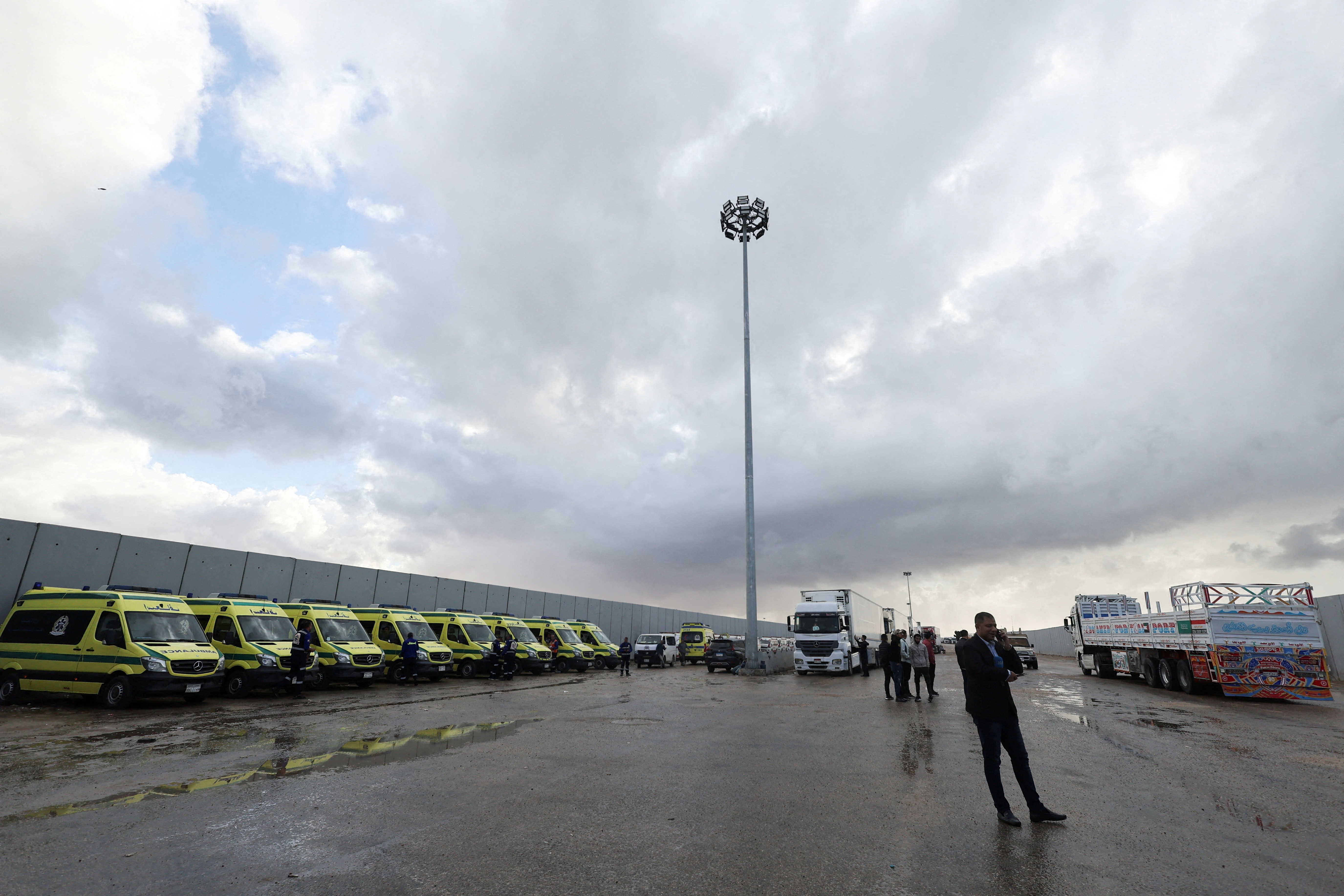 FILE PHOTO: Ambulances wait at the Egyptian side of the Rafah border crossing