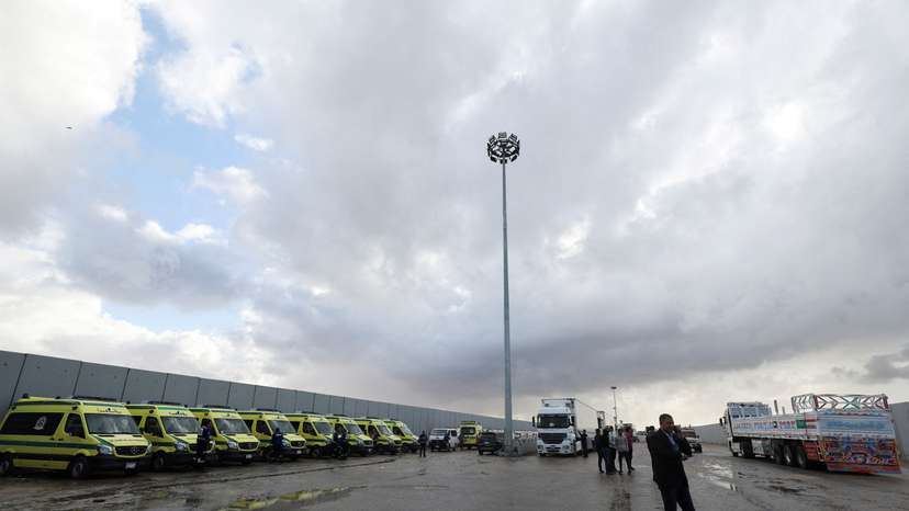FILE PHOTO: Ambulances wait at the Egyptian side of the Rafah border crossing