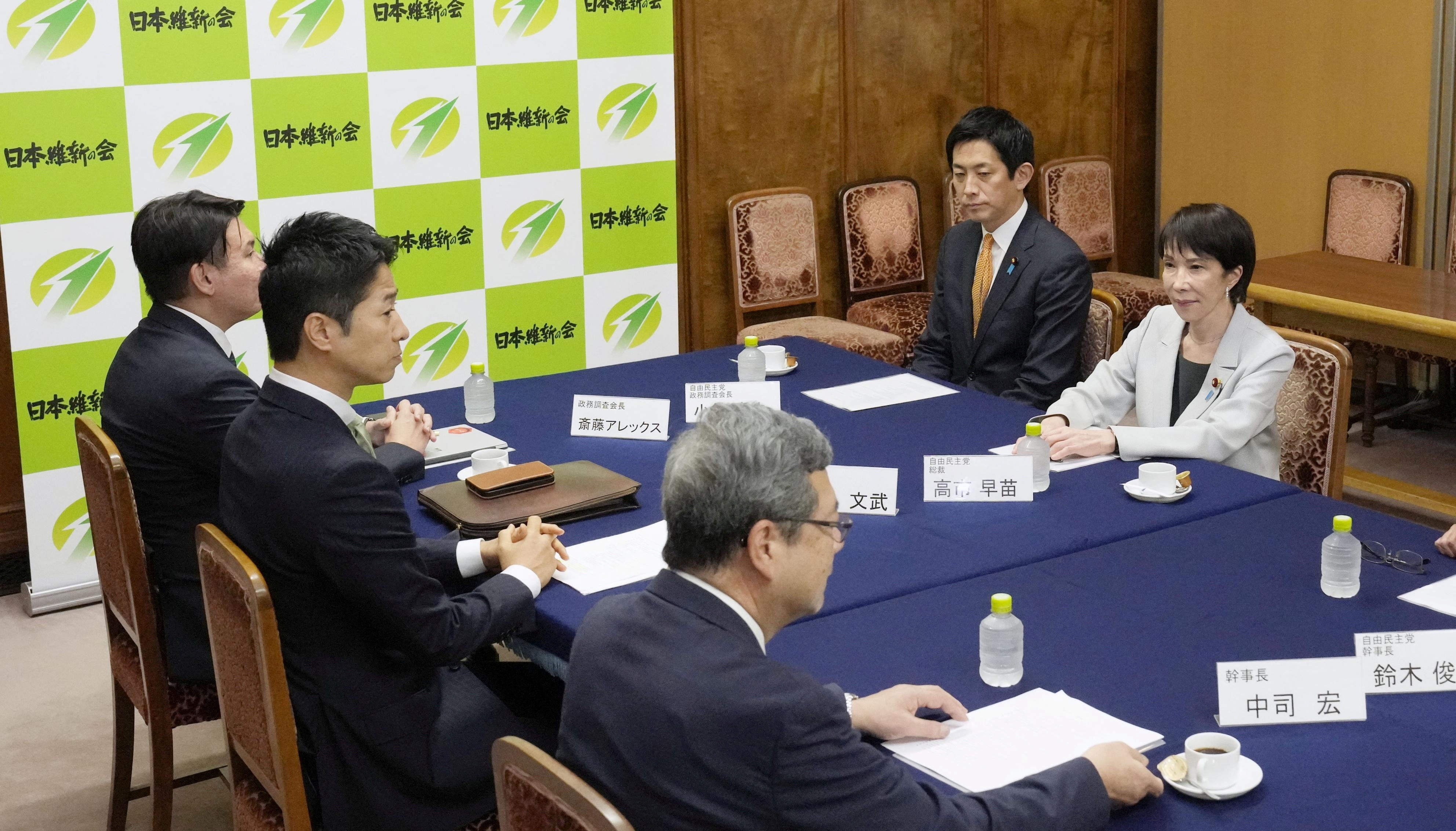 Japan's LDP Leader Sanae Takaichi and Policy Chief Takayuki Kobayashi meet Japan Innovation Party’s Policy Chief Alex Saito, co-leader Fumitake Fujita and secretary-general Hiroshi Nakatsuka in Tokyo