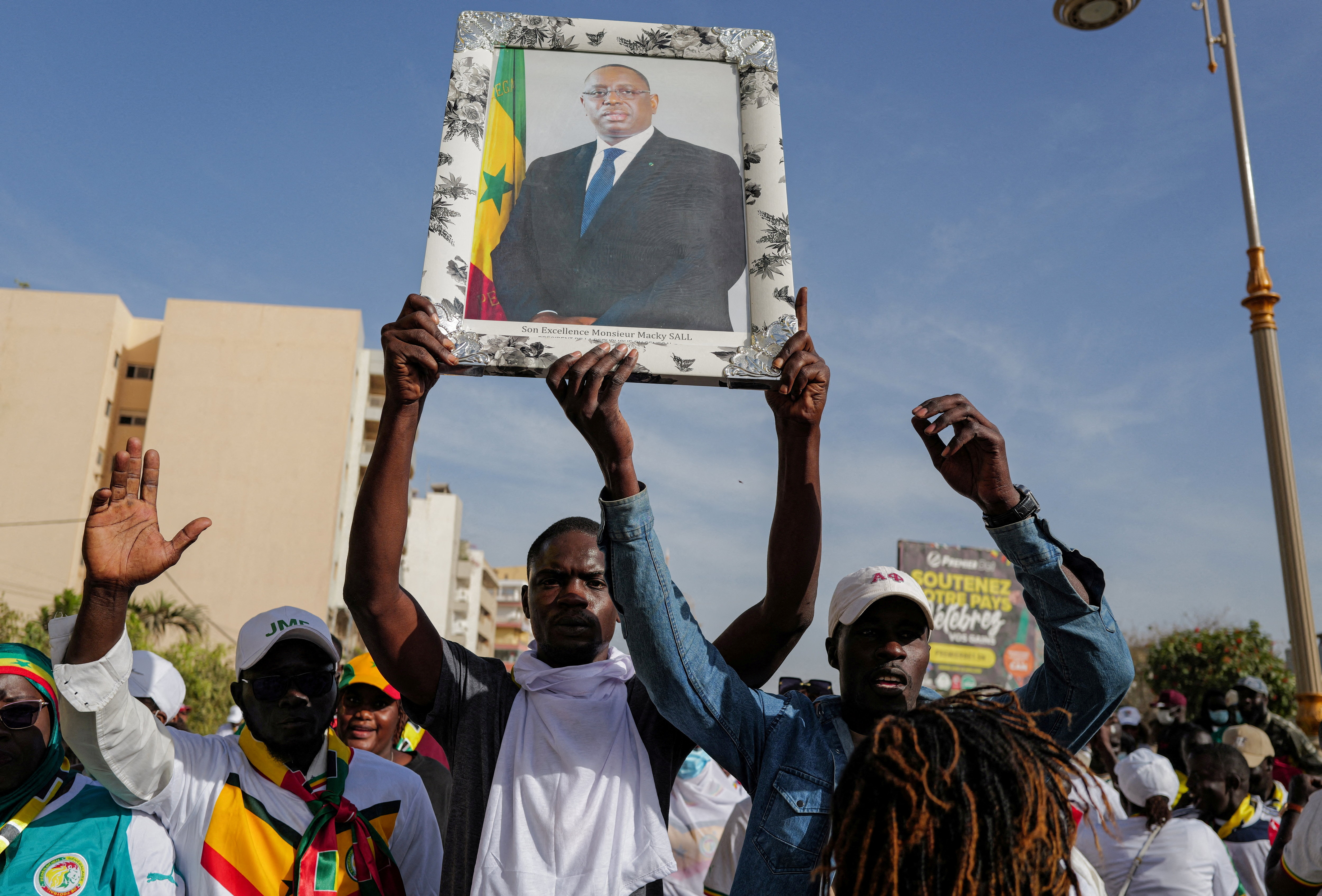 FILE PHOTO: Supporters of Senegalese President Sall demonstrate in Dakar