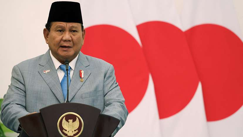 Indonesian President Prabowo Subianto delivers his speech during a press conference at the Presidential Palace in Bogor