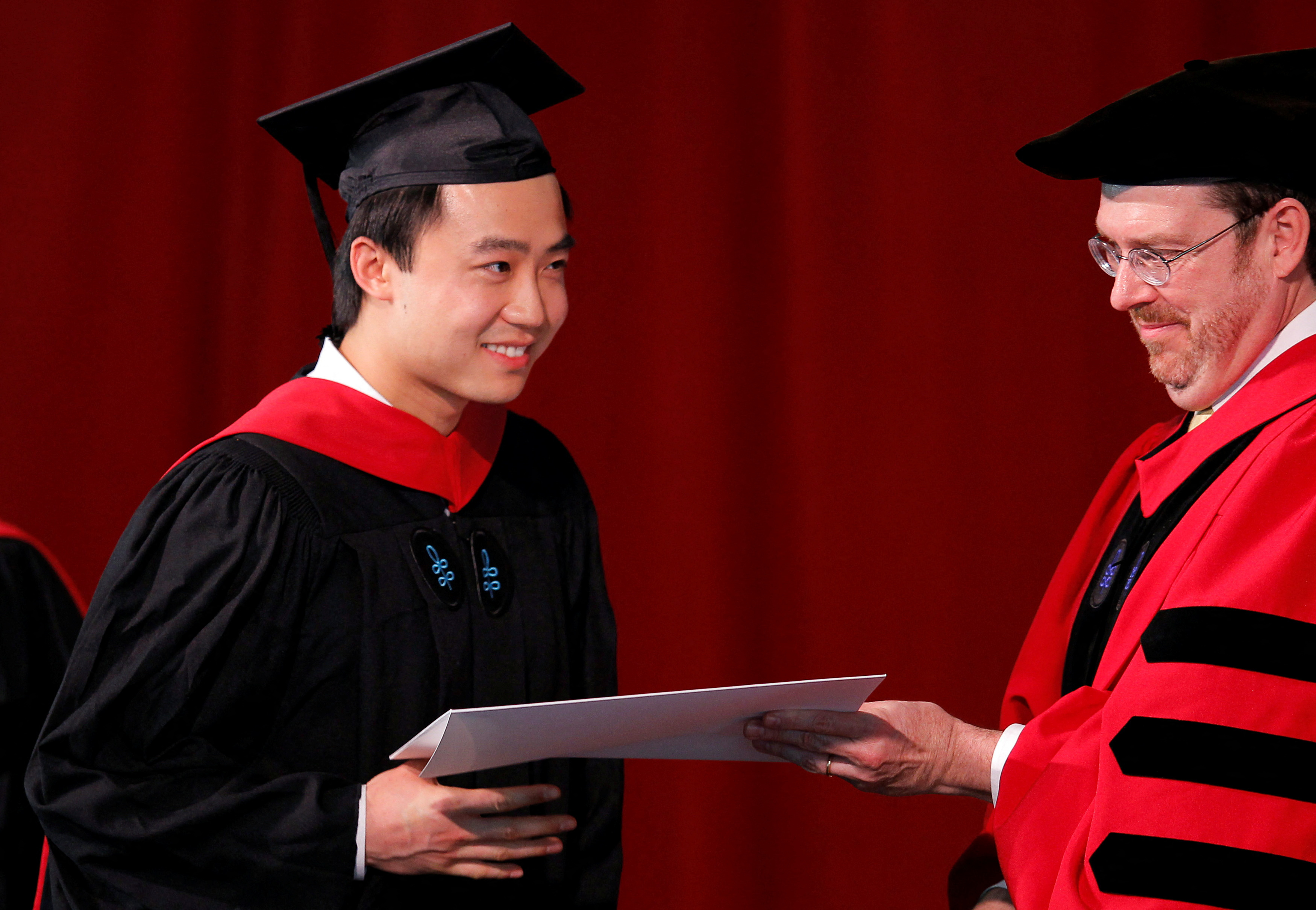 FILE PHOTO: Bo Guagua, son of fallen Chinese politician Bo Xilai, receives his masters degree at Harvard University