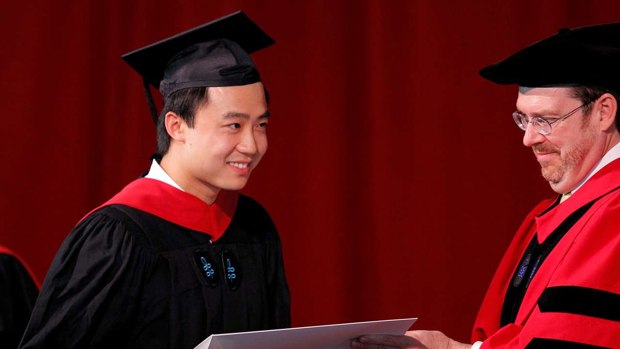 FILE PHOTO: Bo Guagua, son of fallen Chinese politician Bo Xilai, receives his masters degree at Harvard University