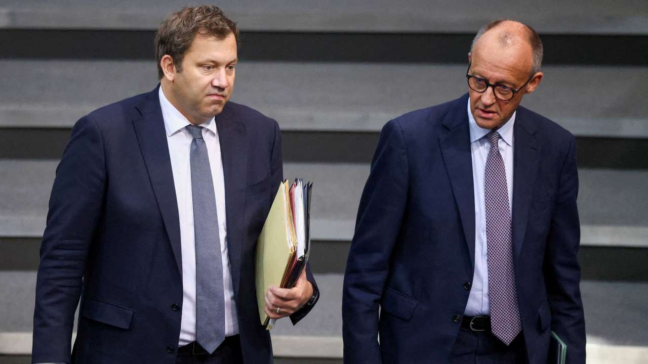 FILE PHOTO: German Chancellor Merz and Finance Minister Klingbeil arrive for budget debate at the Bundestag in Berlin
