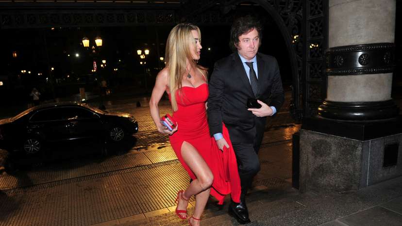 Argentine presidential candidate Javier Milei arrives at the Teatro Colon opera house with his girlfriend, Fatima Florez, ahead of the November 19 runoff elections