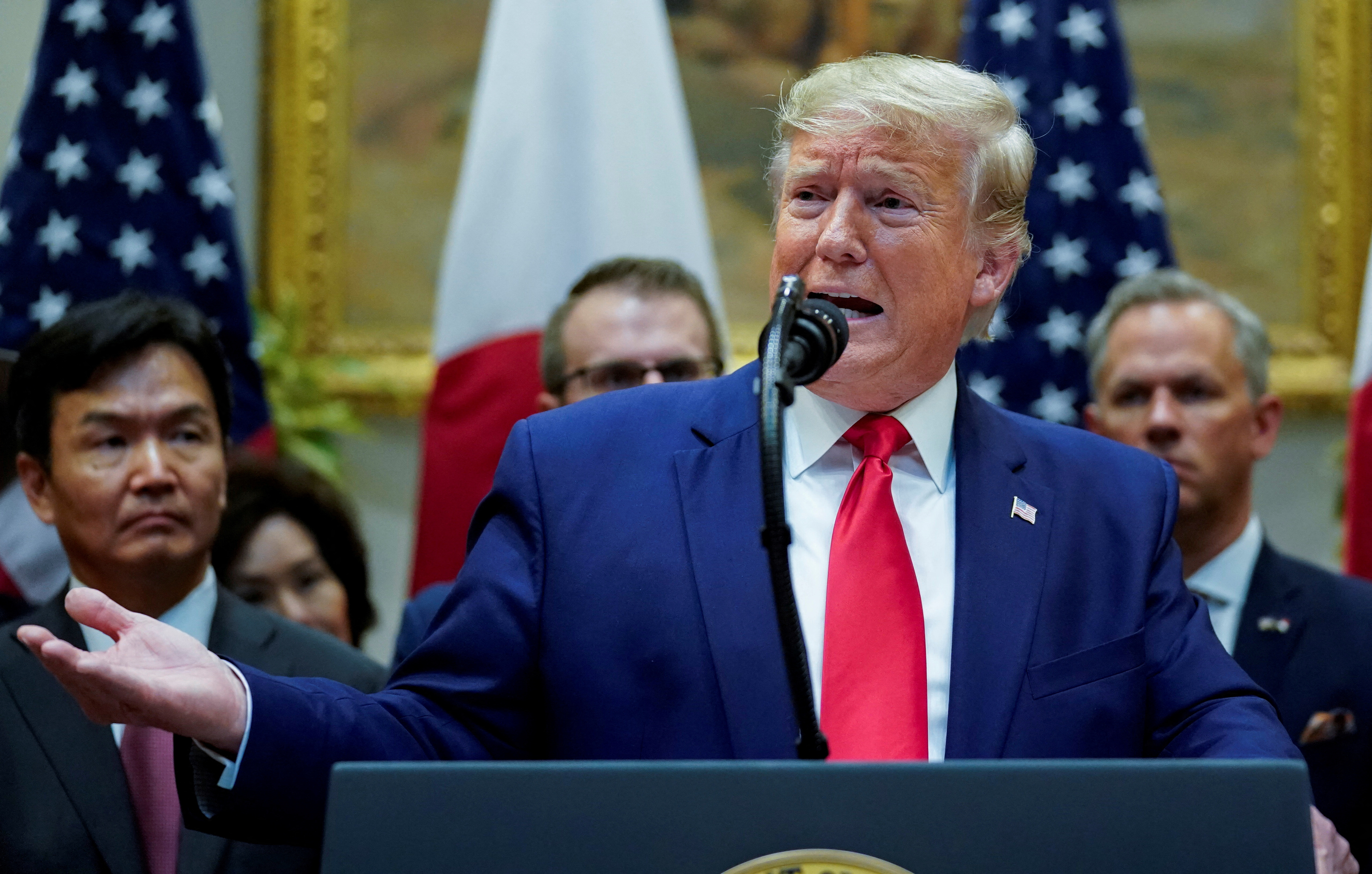 FILE PHOTO: U.S. President Donald Trump speaks during signing ceremony for the U.S.-Japan Trade Agreement at White House in Washington