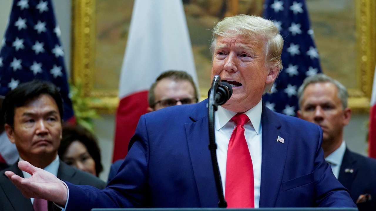 FILE PHOTO: U.S. President Donald Trump speaks during signing ceremony for the U.S.-Japan Trade Agreement at White House in Washington