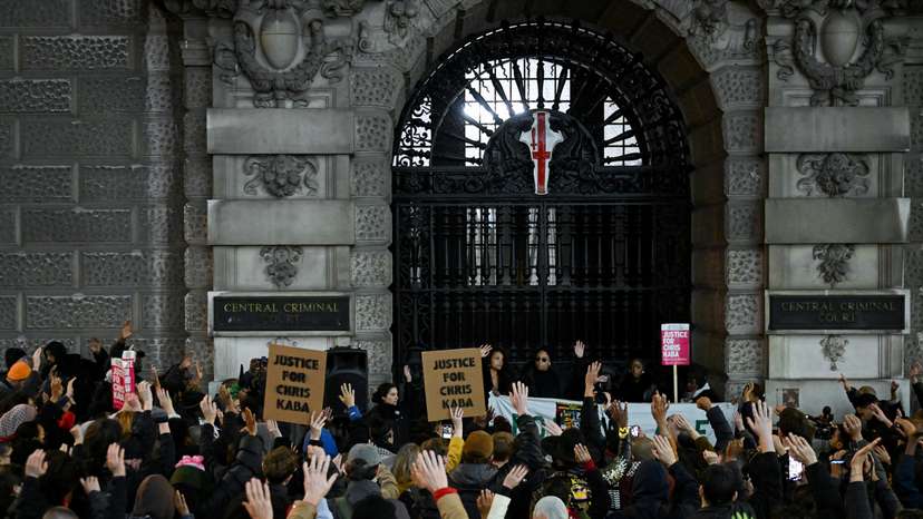 People gather outside Old Bailey after police officer was acquitted of 2022 murder of Chris Kaba, in London
