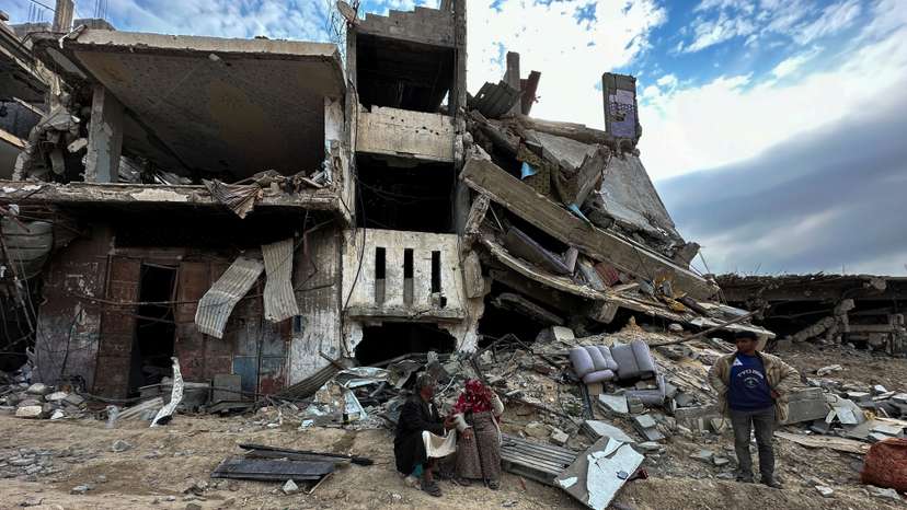 A Palestinian family returns to Khan Younis after Israeli forces withdrew from the city, southern Gaza Strip
