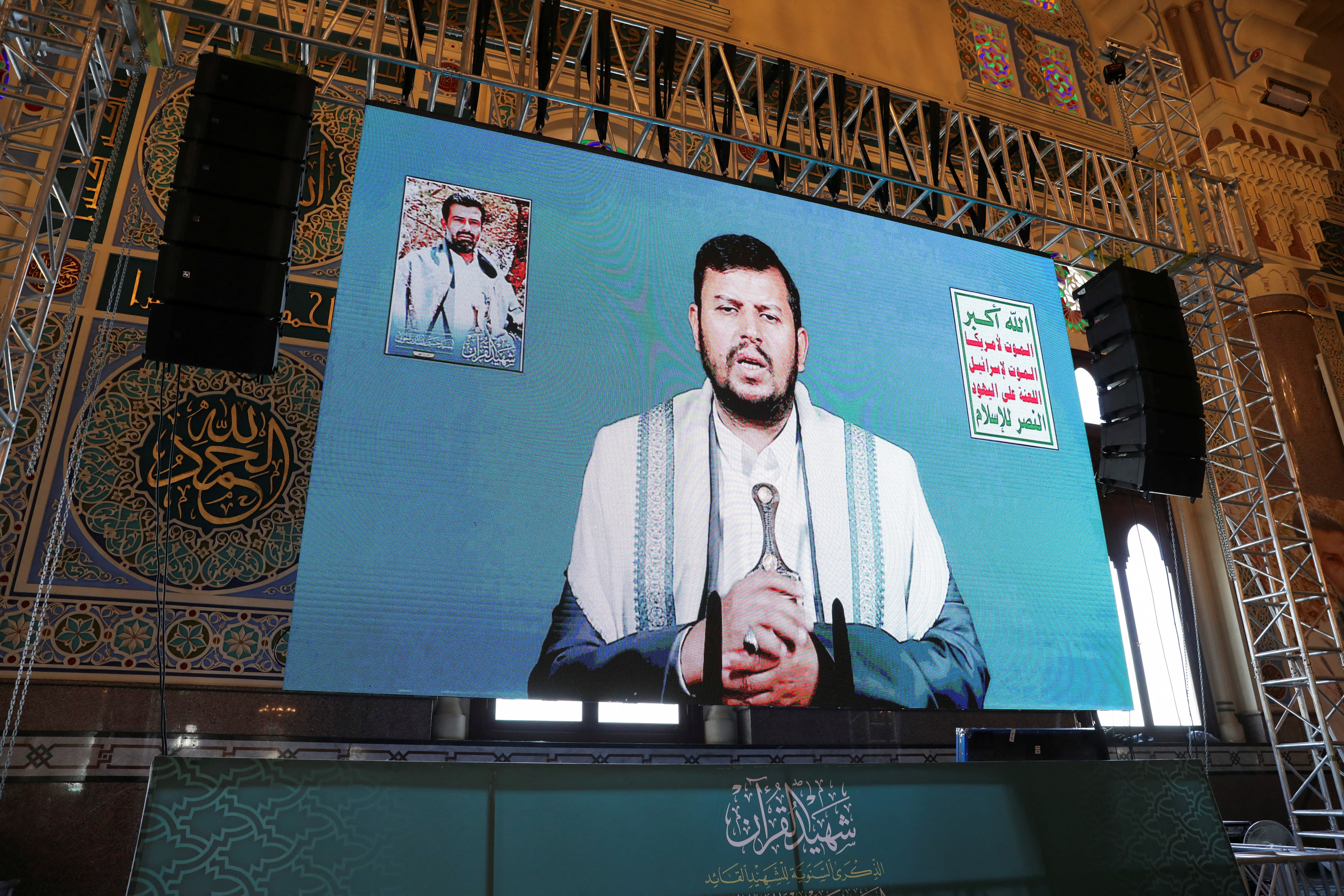 FILE PHOTO: Houthi leader Abdul-Malik al-Houthi addresses followers via a video link in Sanaa