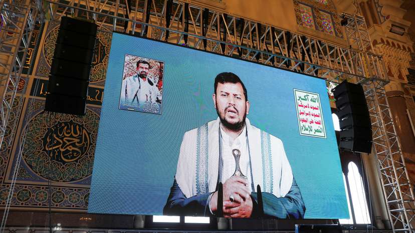 FILE PHOTO: Houthi leader Abdul-Malik al-Houthi addresses followers via a video link in Sanaa