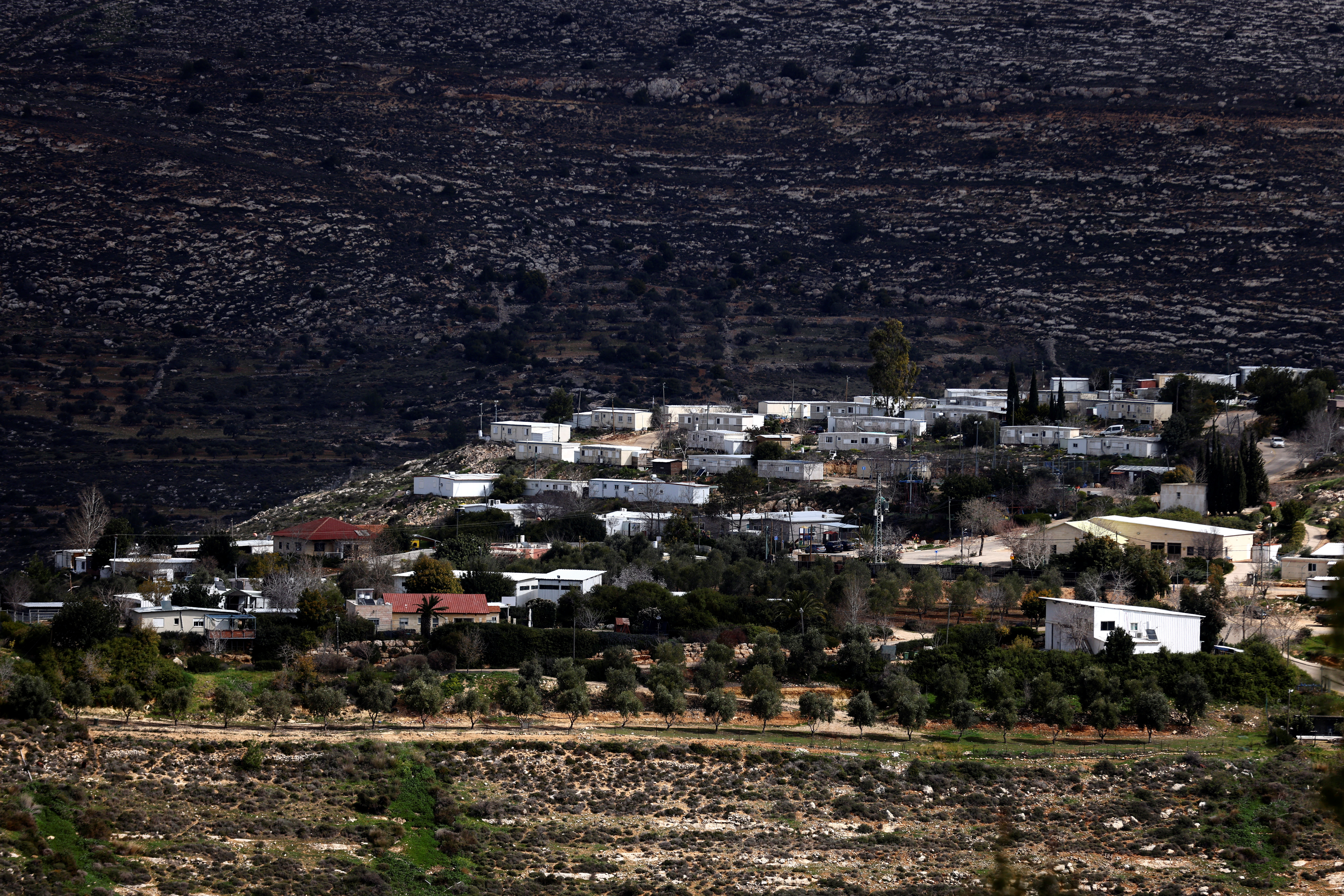 A view shows homes in the Jewish settlement of Givat Harel, taken from the Jewish settlement of Givat Haroeh in the Israeli-occupied West Bank