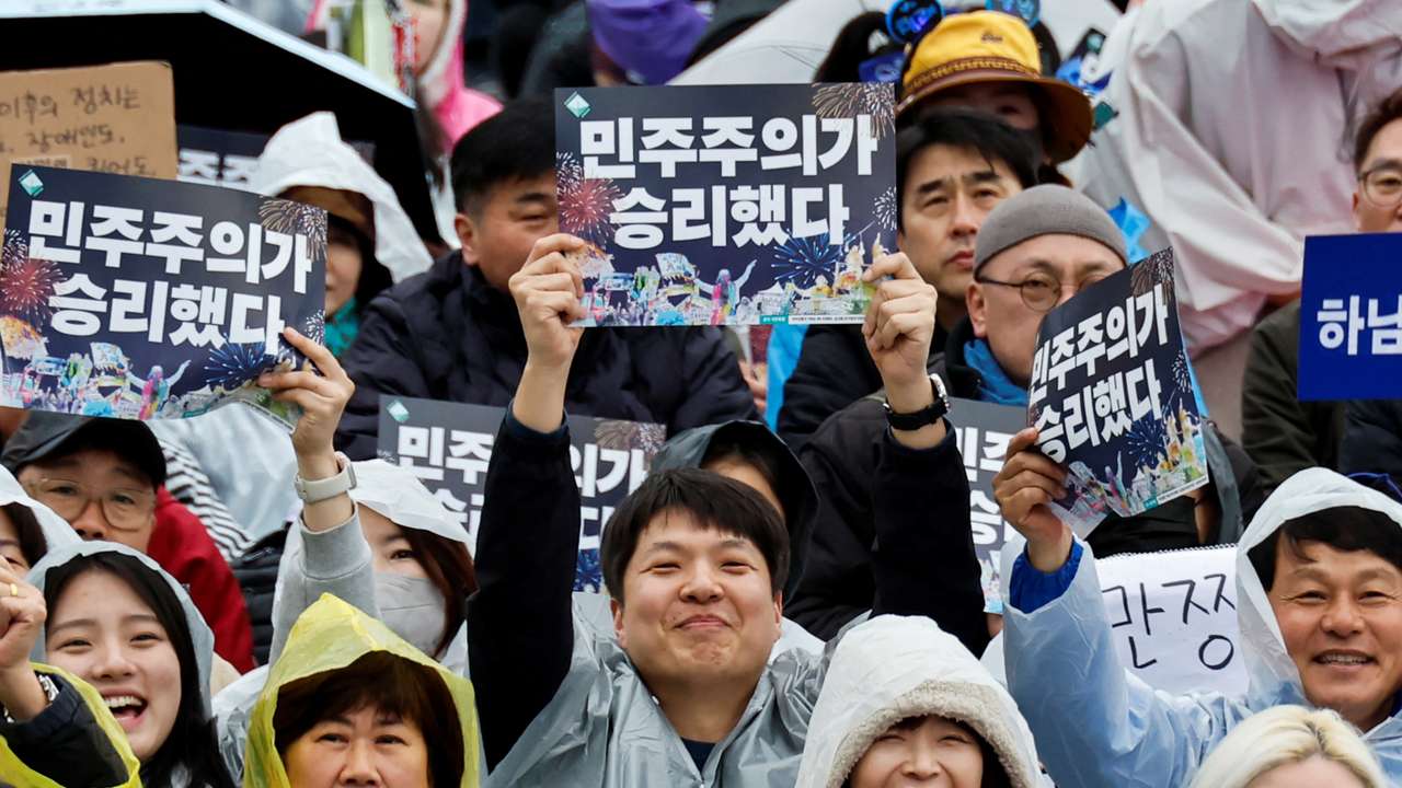 People attend a rally to celebrate the expulsion of South Korean President Yoon Suk Yeol in Seoul