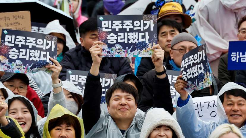 People attend a rally to celebrate the expulsion of South Korean President Yoon Suk Yeol in Seoul