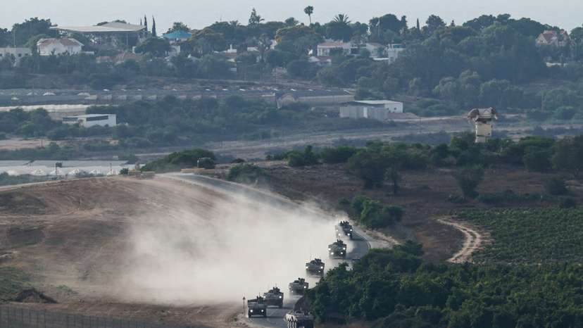 An Israeli military convoy manoeuvres near the Israel-Gaza border