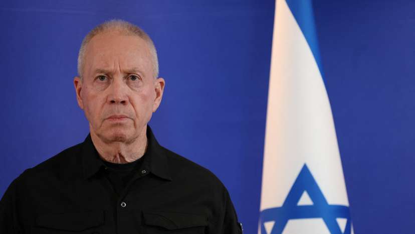 Former Israeli Defense Minister Yoav Gallant speaks to members of the press, in Tel Aviv