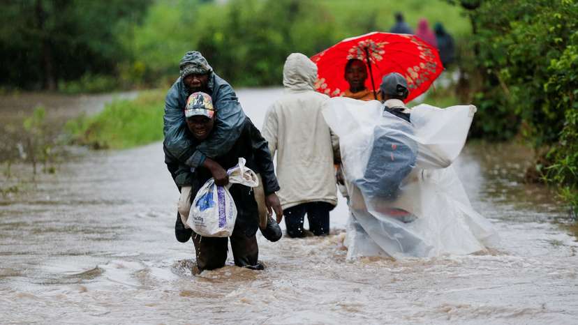 Residents affected after a seasonal river burst its banks following heavy rainfall in Kitengela municipality of Kajiado County