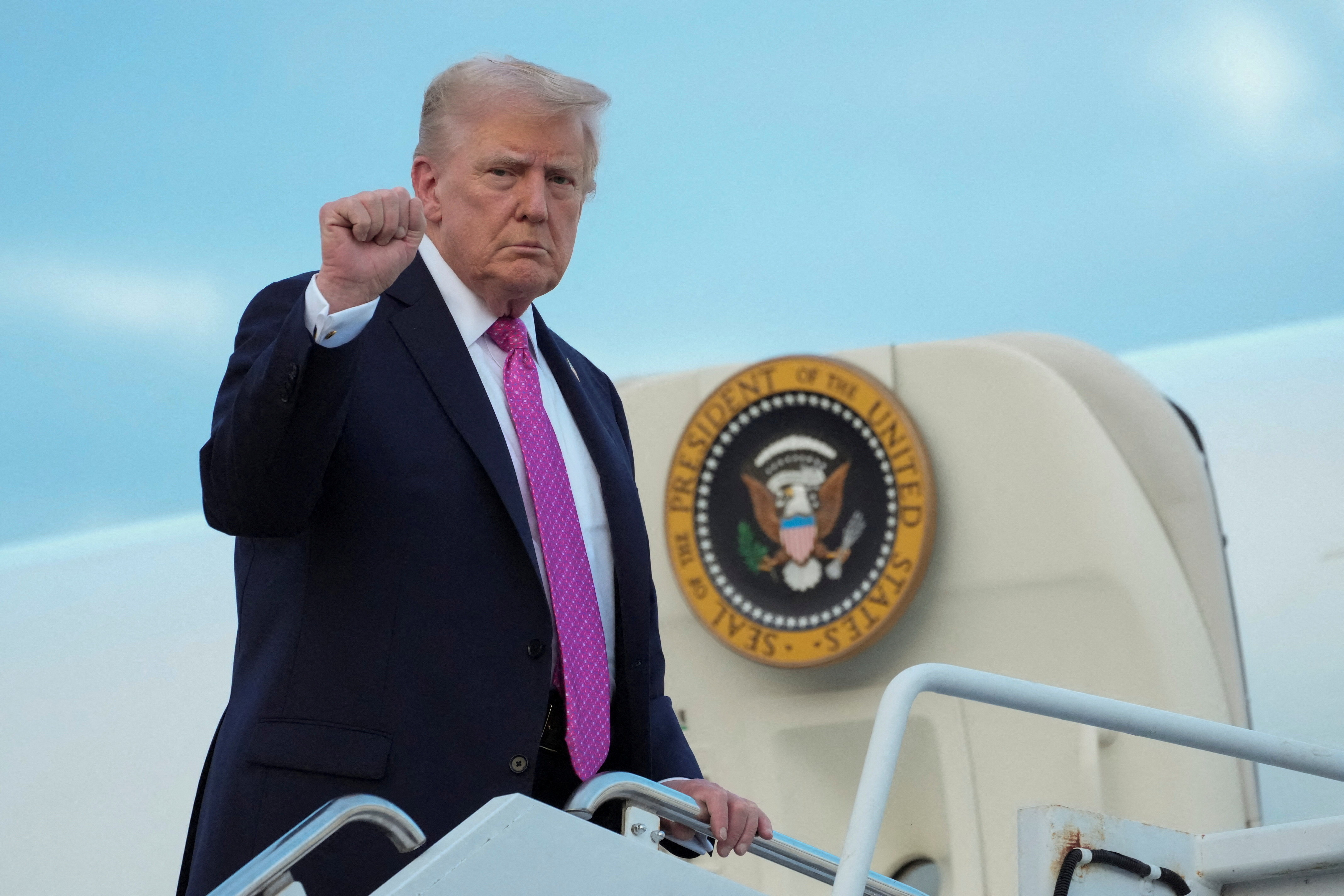 FILE PHOTO: U.S. President Donald Trump departs from Morristown Municipal Airport in Morristown, New Jersey