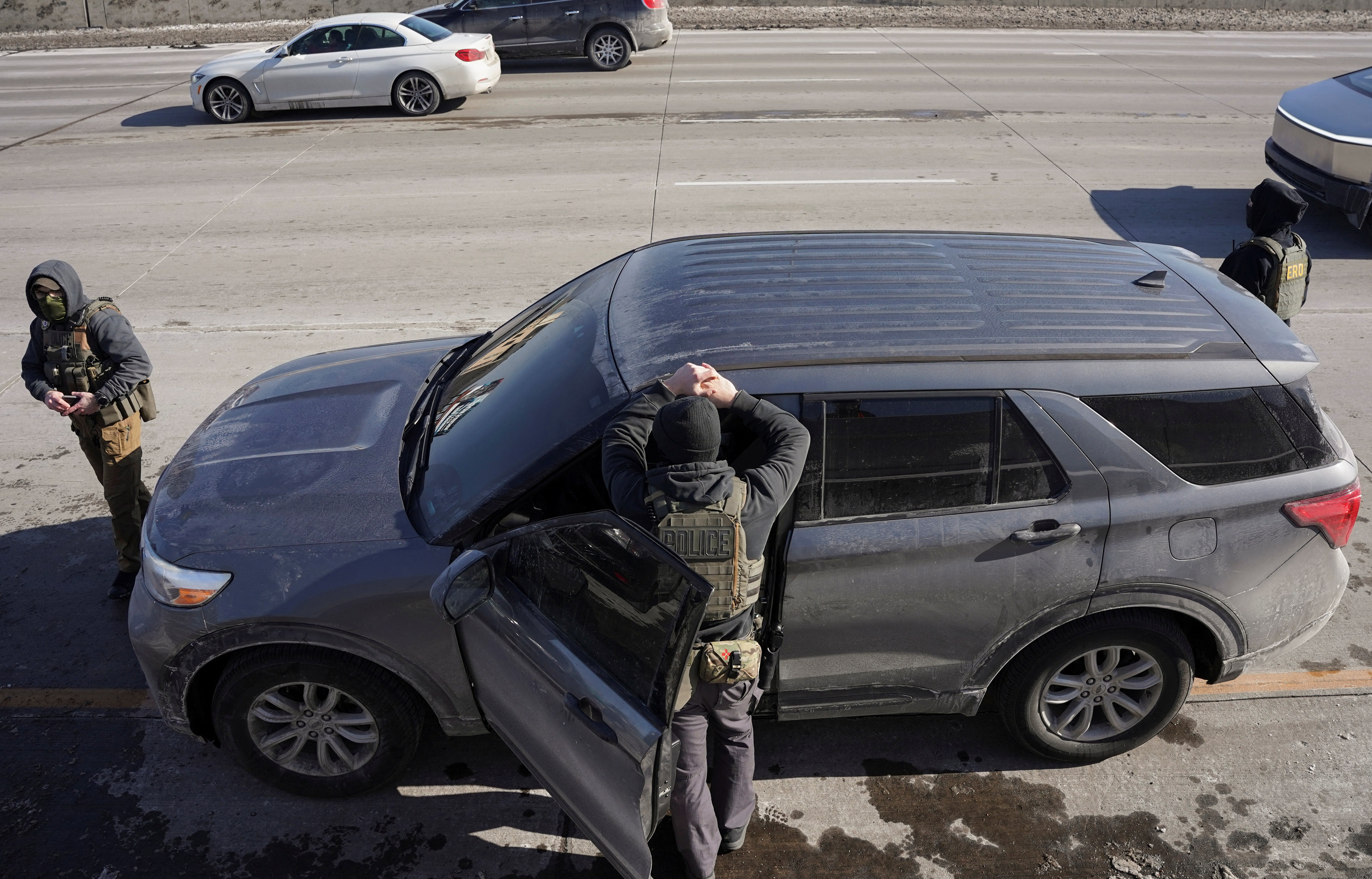 Federal immigration agents conduct immigration enforcement tasks in Minneapolis