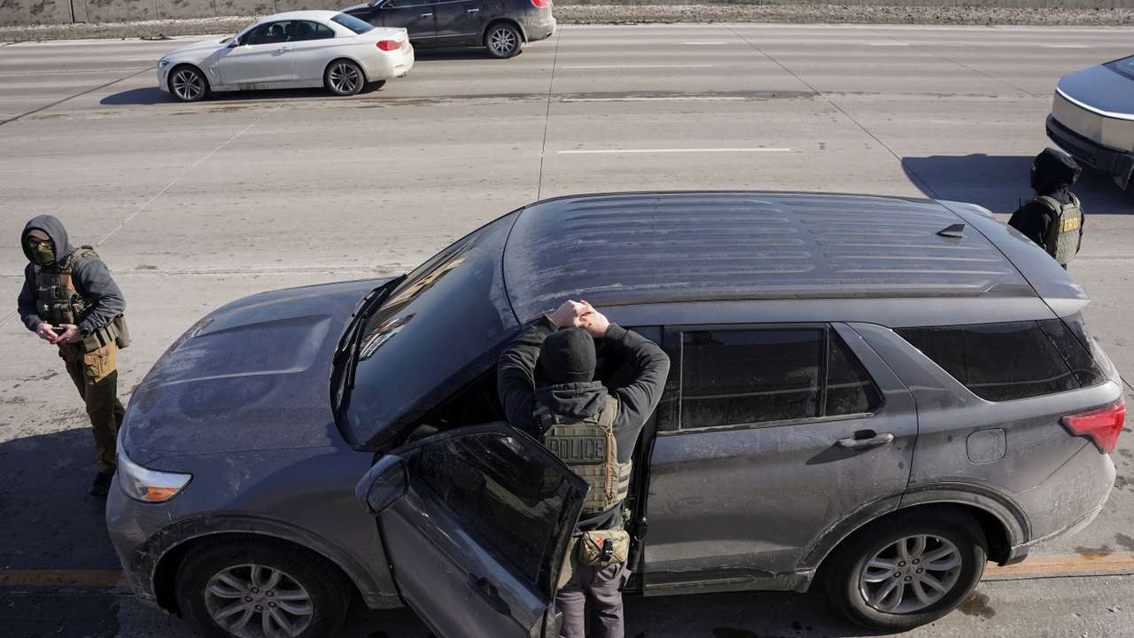 Federal immigration agents conduct immigration enforcement tasks in Minneapolis