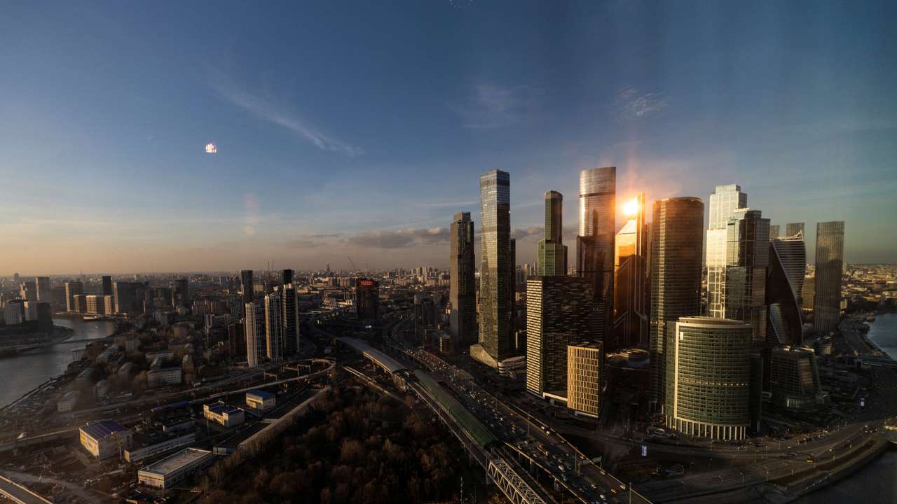 An aerial view shot through a window shows Moscow International Business Centre