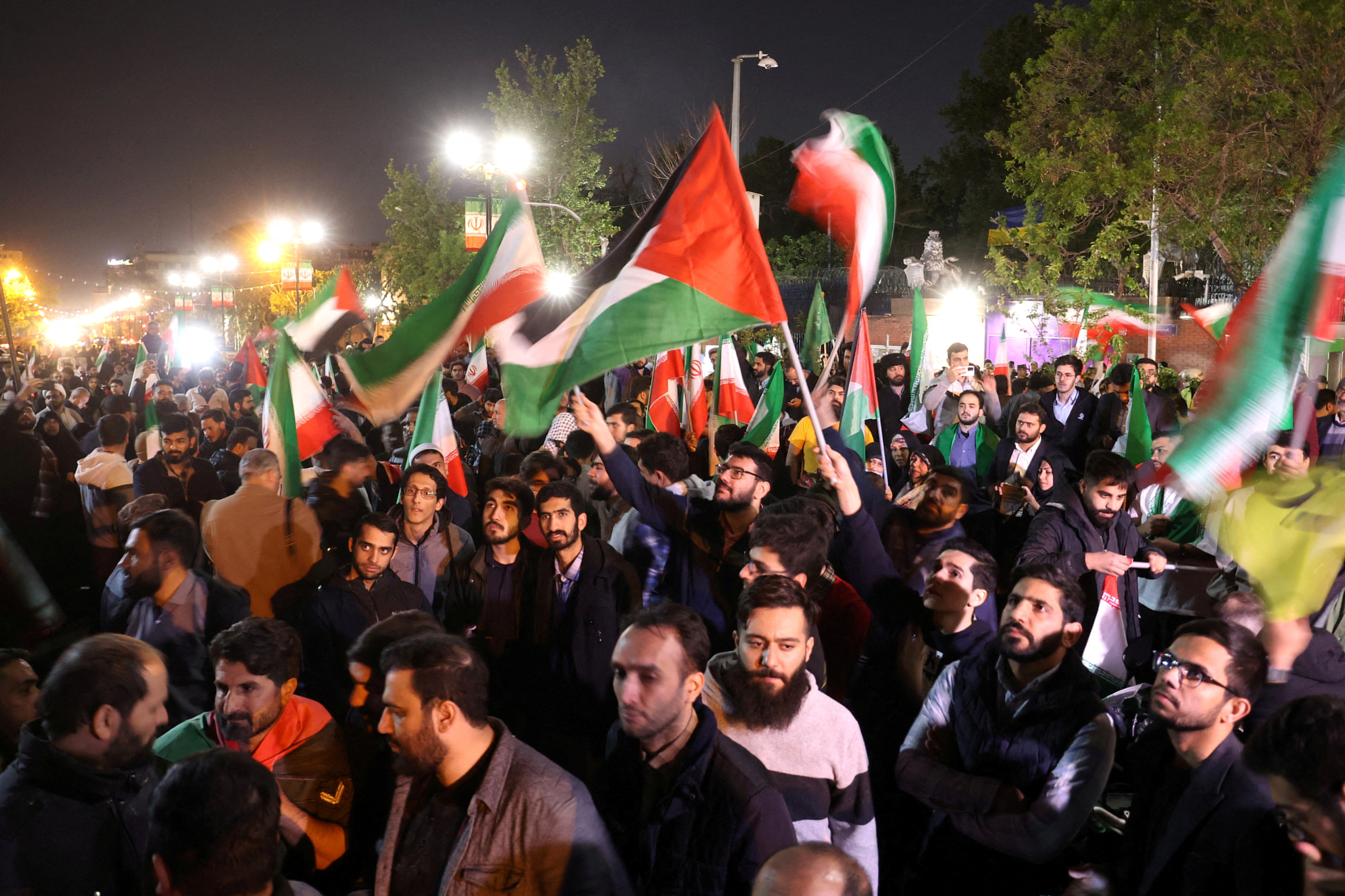 FILE PHOTO: Iranians react after the IRGC attack on Israel, in Tehran, Iran