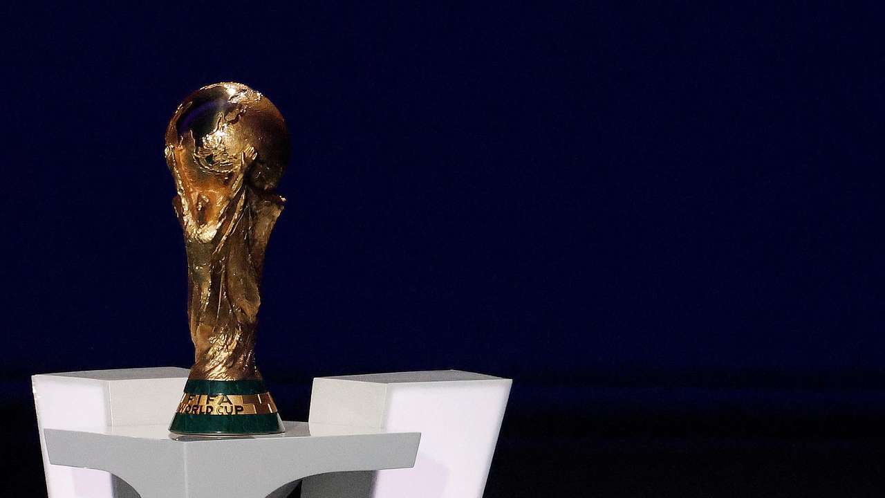 FILE PHOTO: Dec 5, 2025; Washington, District of Columbia, USA; The World Cup trophy sits on a podium during the FIFA World Cup 2026 Final Draw at John F. Kennedy Center for the Performing Arts. Mandatory Credit: Amber Searls-Imagn Images/File Photo