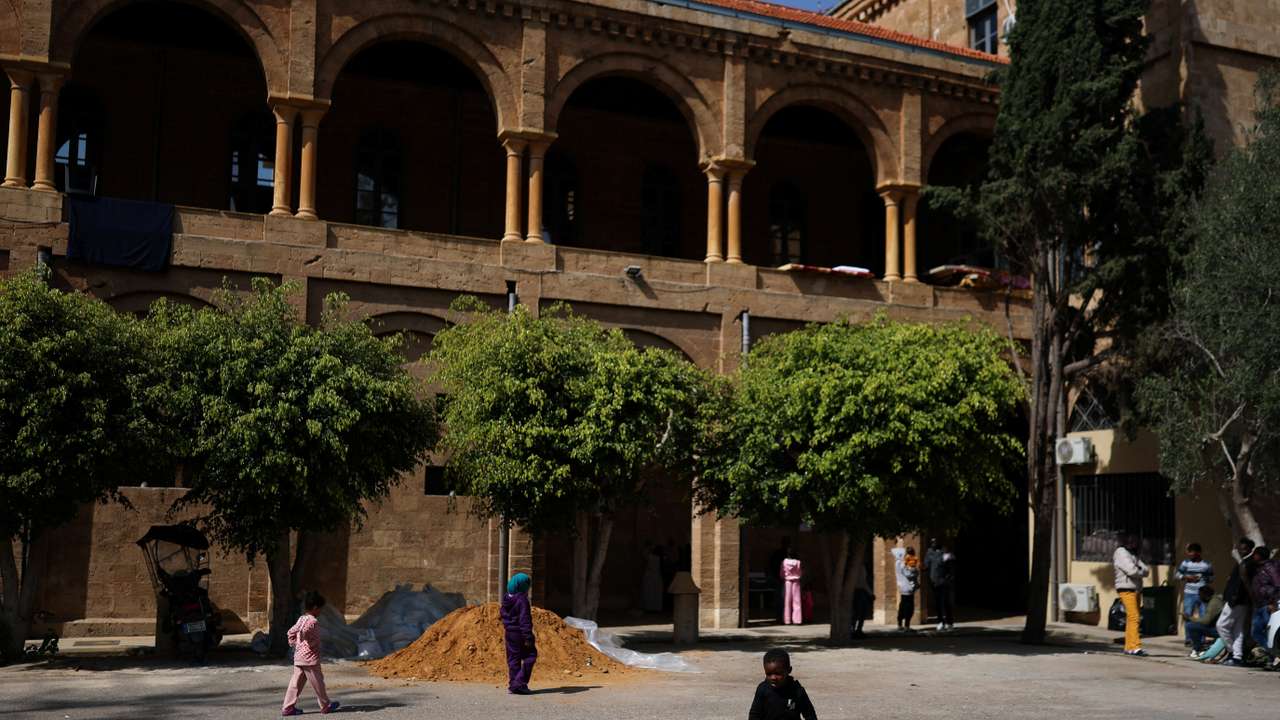 Refugees and displaced migrant workers shelter in St. Joseph Church, following an escalation between Hezbollah and Israel amid the U.S.-Israeli conflict with Iran, in Beirut