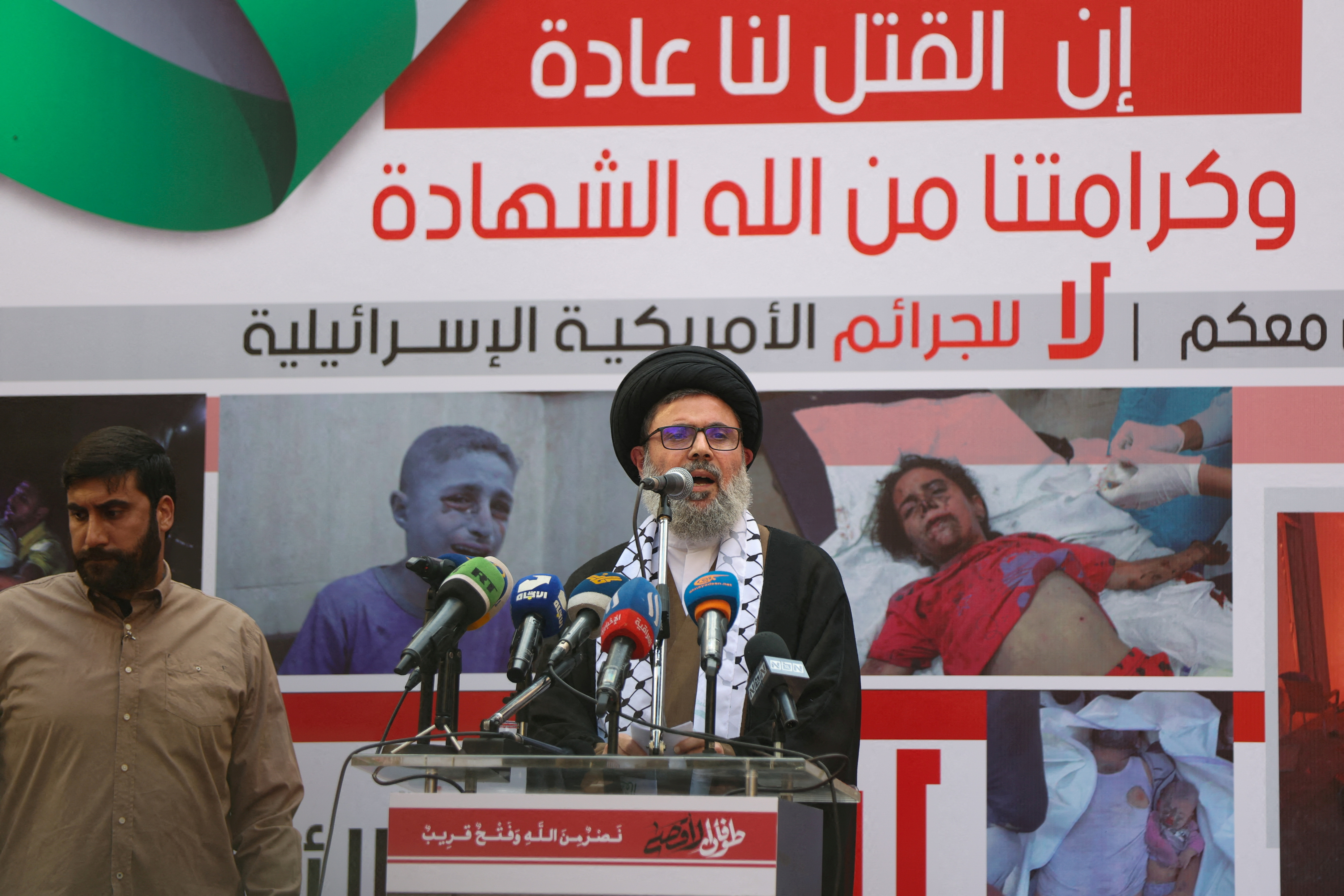 FILE PHOTO: Hezbollah supporters protest over Gaza hospital strike, in Beirut