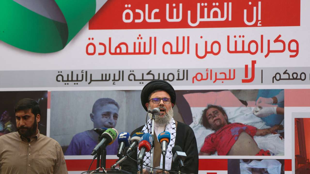 FILE PHOTO: Hezbollah supporters protest over Gaza hospital strike, in Beirut