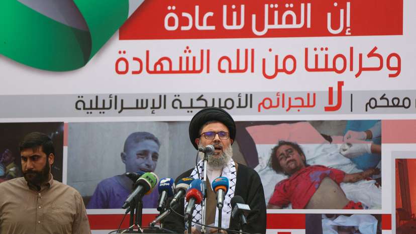 FILE PHOTO: Hezbollah supporters protest over Gaza hospital strike, in Beirut
