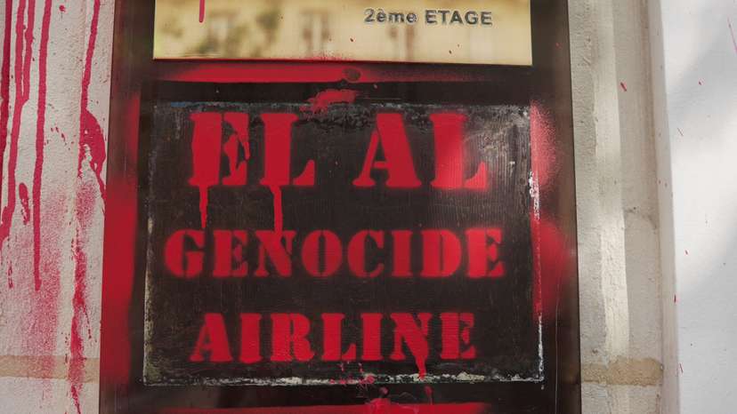 The entrance of the EL AI Israel Airlines offices sprayed with red paint in Paris
