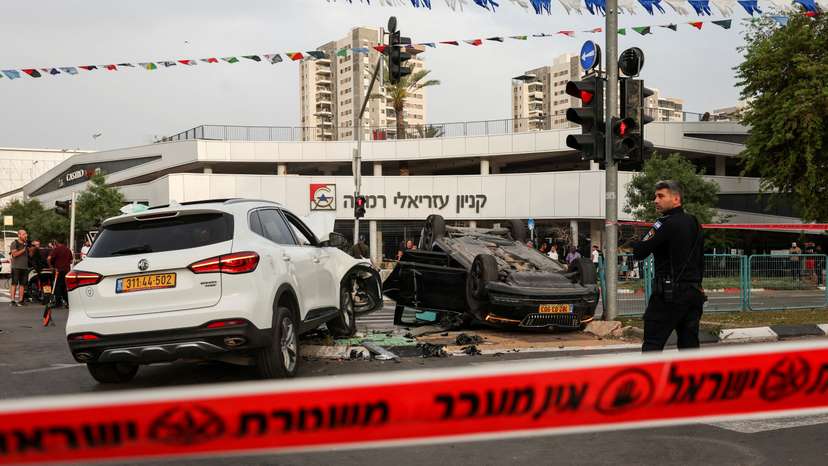 Israeli security forces secure the area where a suspected stabbing incident took place, in Ramle