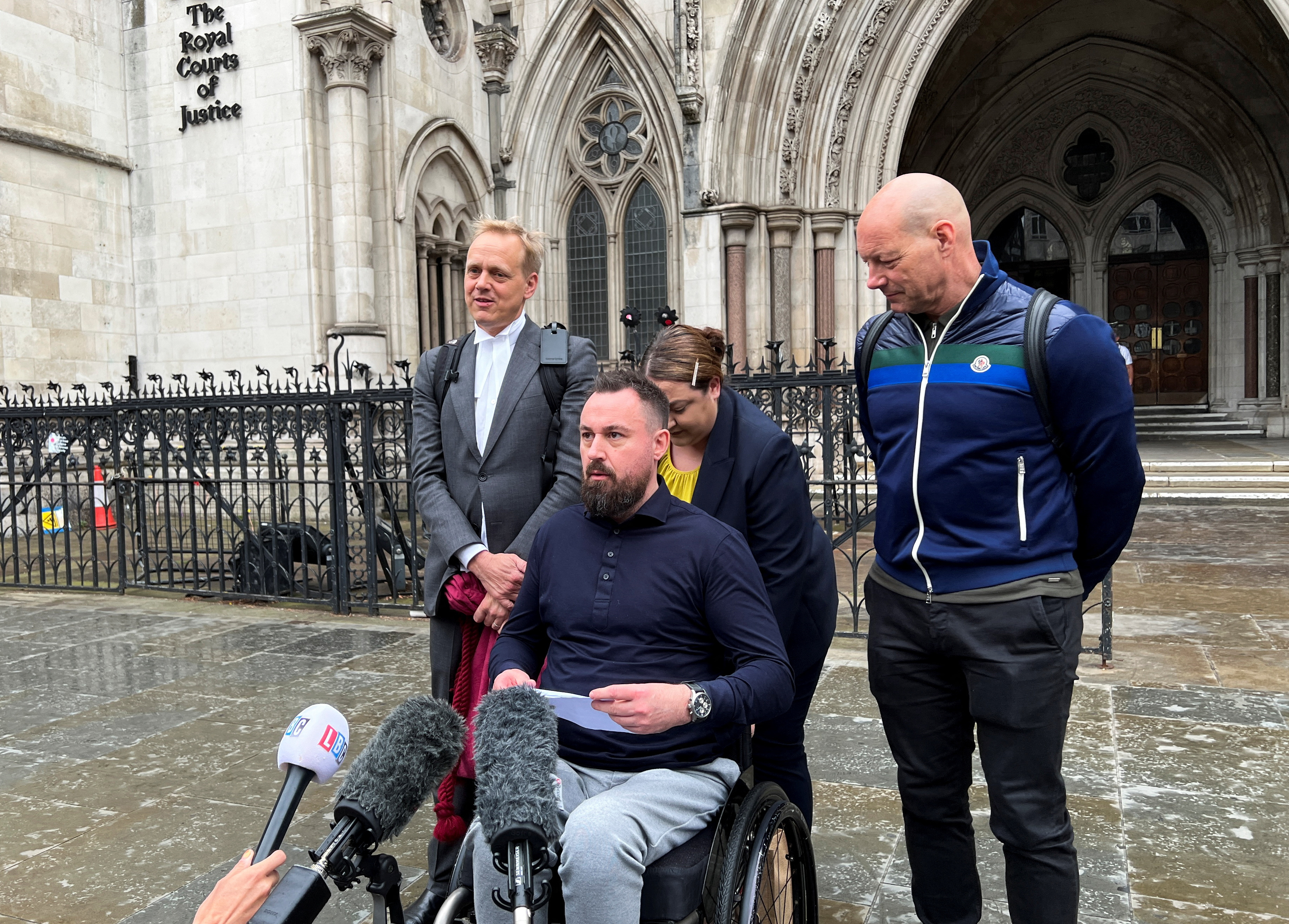 Martin Hibbert speaks to media outside the Royal Courts of Justice after the trial of his lawsuit against Richard D. Hall, in London