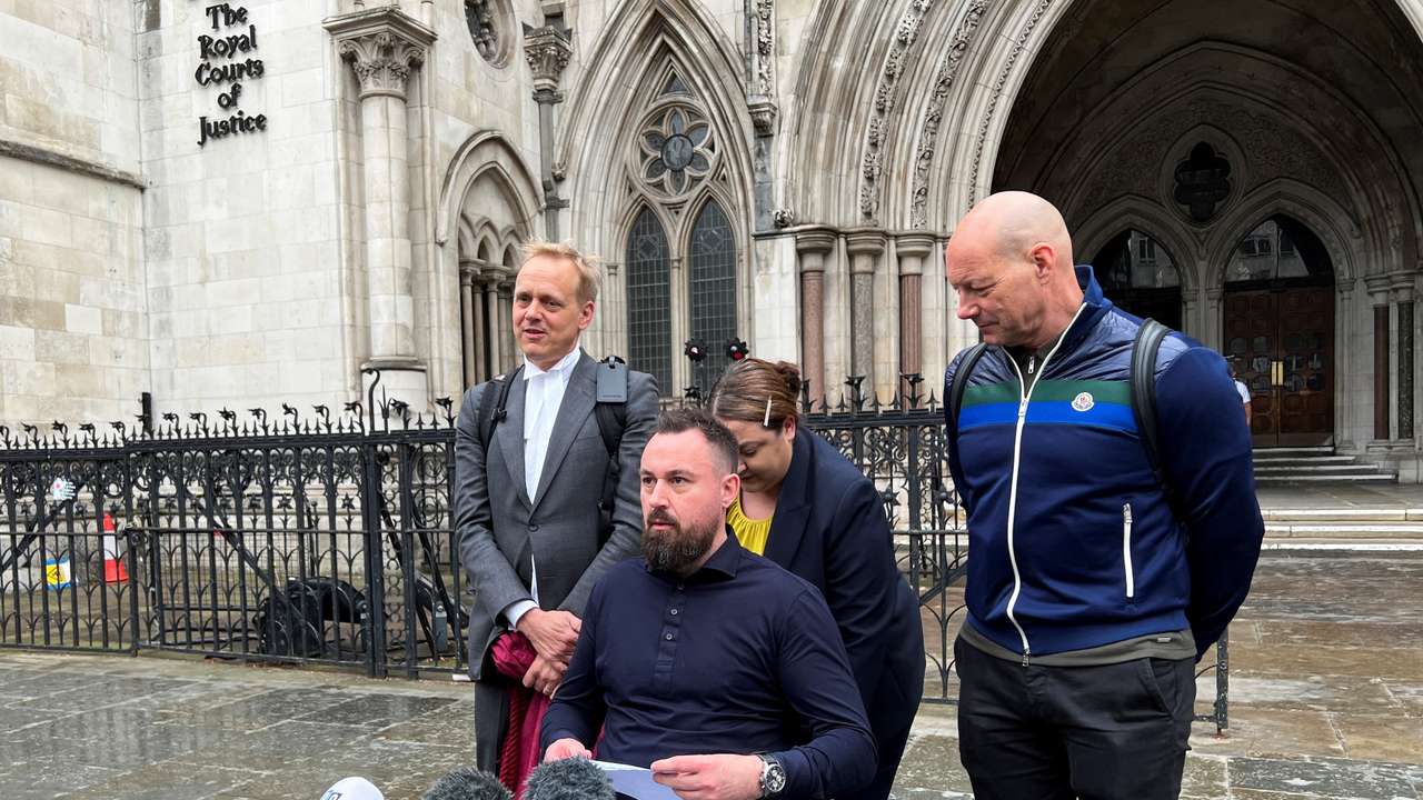 Martin Hibbert speaks to media outside the Royal Courts of Justice after the trial of his lawsuit against Richard D. Hall, in London